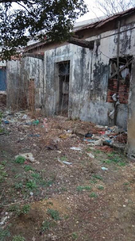 Picture shows : Exterior of the house in which Zhang Qi, 24, is allegedly being kept. Cruel parents who kept their daughter locked up in a ramshackle old house for six years are being investigated by police. Long-suffering Zhang Qi, 24, was forced into the filthy, dilapidated building after her parents made her dump her boyfriend in 2009 because they didnít approve of him. But despite being told the relationship was over, Zhang tried several times to run away before her parents told everybody that she was mentally ill, and locked up for her own protection in the remote property in the village of Jingang village in central Chinaís Hubei province. Villager Chow Jen, 50, said: 'Her parents are powerful people here and everyone was told not to interfere. 'Everyone knew about the girl in the house. I moved away and only come back to visit occasionally so I don't care about their threats, and that's why was happy to expose these pictures online after the local authorities refused to do anyt