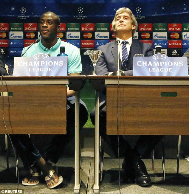HLV Pellegrini và Yaya Toure trong buổi họp báo