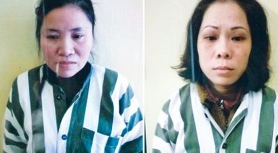 Hai bị can Nguyễn Thị Thanh Trang (b&ecirc;n tr&aacute;i) v&agrave; Phạm Thị Nguyệt