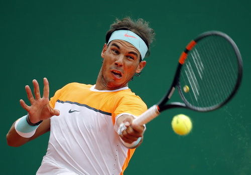 Nadal chật vật vượt qua John Isner giành quyền vào tứ kết