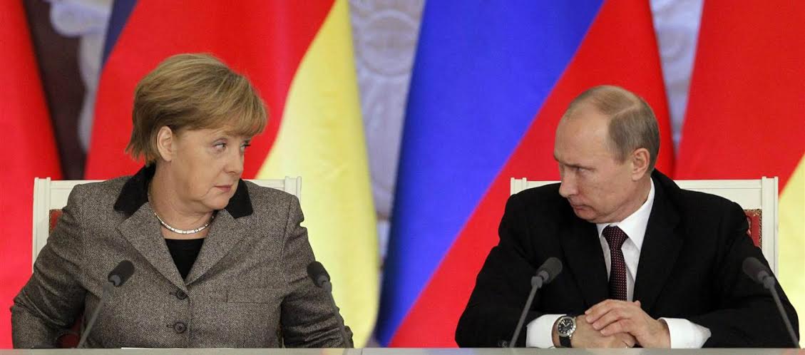 Tổng thống Nga Vladimir Putin v&agrave; Thủ tướng Đức Angela Merkel

Ảnh: Reuters