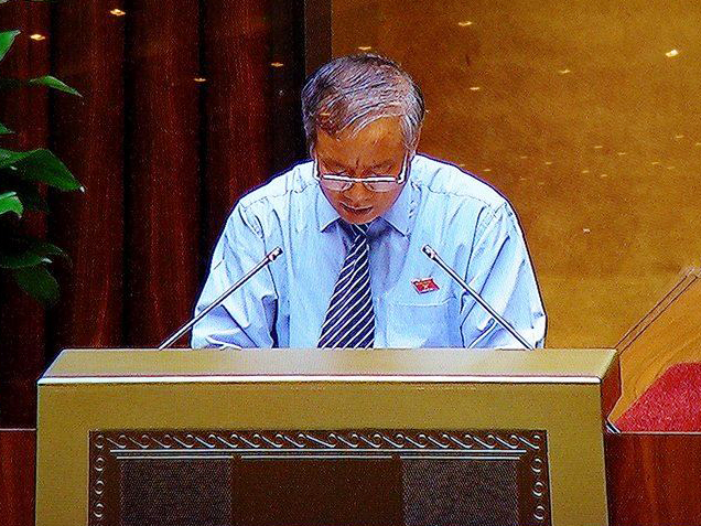 Ông Nguyễn Kim Khoa, Chủ nhiệm Ủy ban Quốc phòng và An ninh của Quốc hội trình bày báo cáo giải trình và tiếp thu của Ủy ban Thường vụ QH