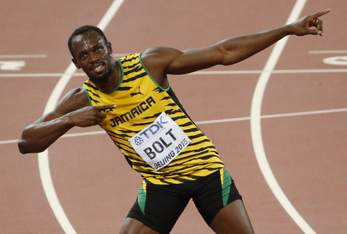 H&igrave;nh ảnh vui mừng chiến thắng quen thuộc của Usain Bolt được t&aacute;i hiện tr&ecirc;n s&acirc;n Bắc Kinh sau 7 năm.