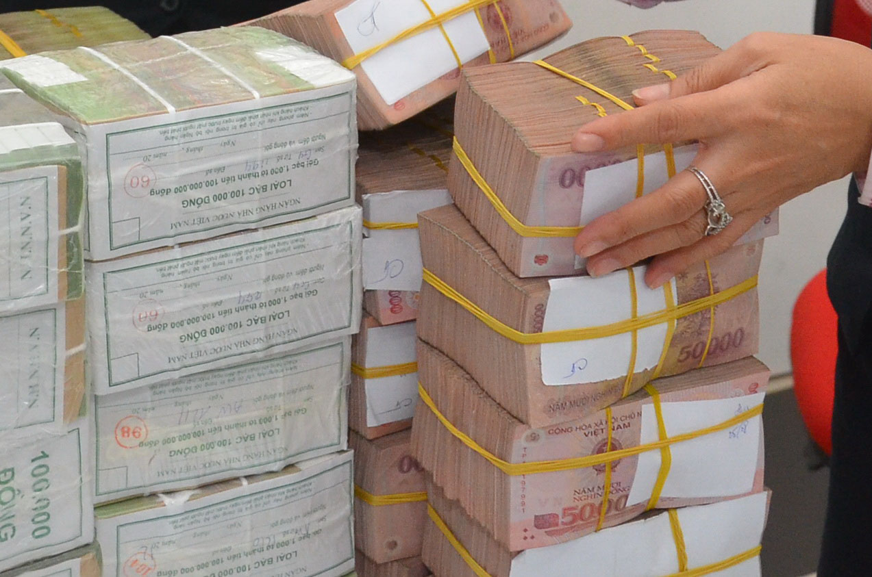 Nhiều khách hàng gặp rắc rối khi vay tiêu dùng do không đọc kỹ hợp đồng Ảnh: TẤN THẠNH