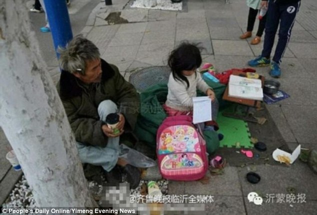 Cô bé 6 tuổi này cho biết rất thích học... Ảnh: Peoples Daily