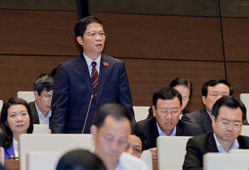 Bộ trưởng Bộ Công Thương Trần Tuấn Anh trong một lần phát biểu tại hội trường QH - Ảnh: Quochoi.vn