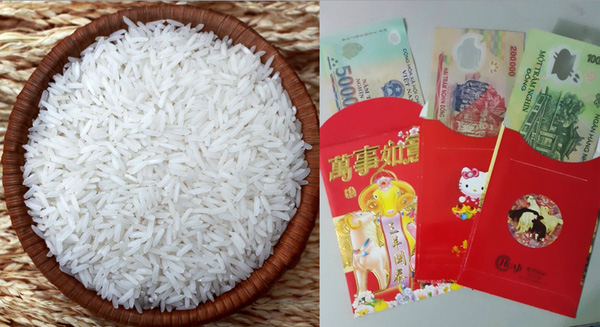 C&oacute; thể đặt một đồng tiền hoặc sợi d&acirc;y đỏ, bao l&igrave; x&igrave; v&agrave;o đ&aacute;y hũ gạo với &yacute; nghĩ chi&ecirc;u tụ may mắn đến nh&agrave;.