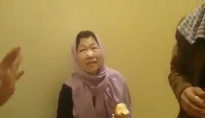Vợ ông Ri Yong, bà So Young Ju. Ảnh: Youtube