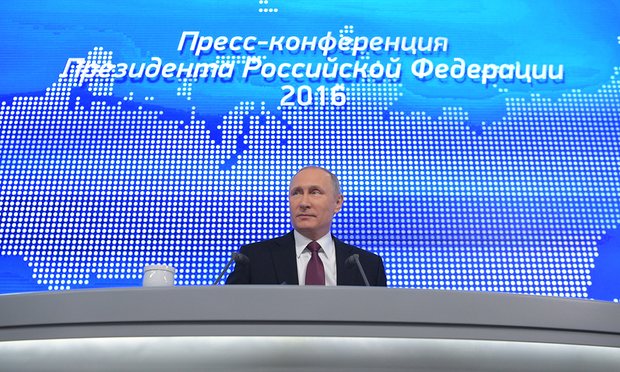 &Ocirc;ng Putin tại cuộc họp b&aacute;o thường ni&ecirc;n h&ocirc;m 23-12. Ảnh: Tass