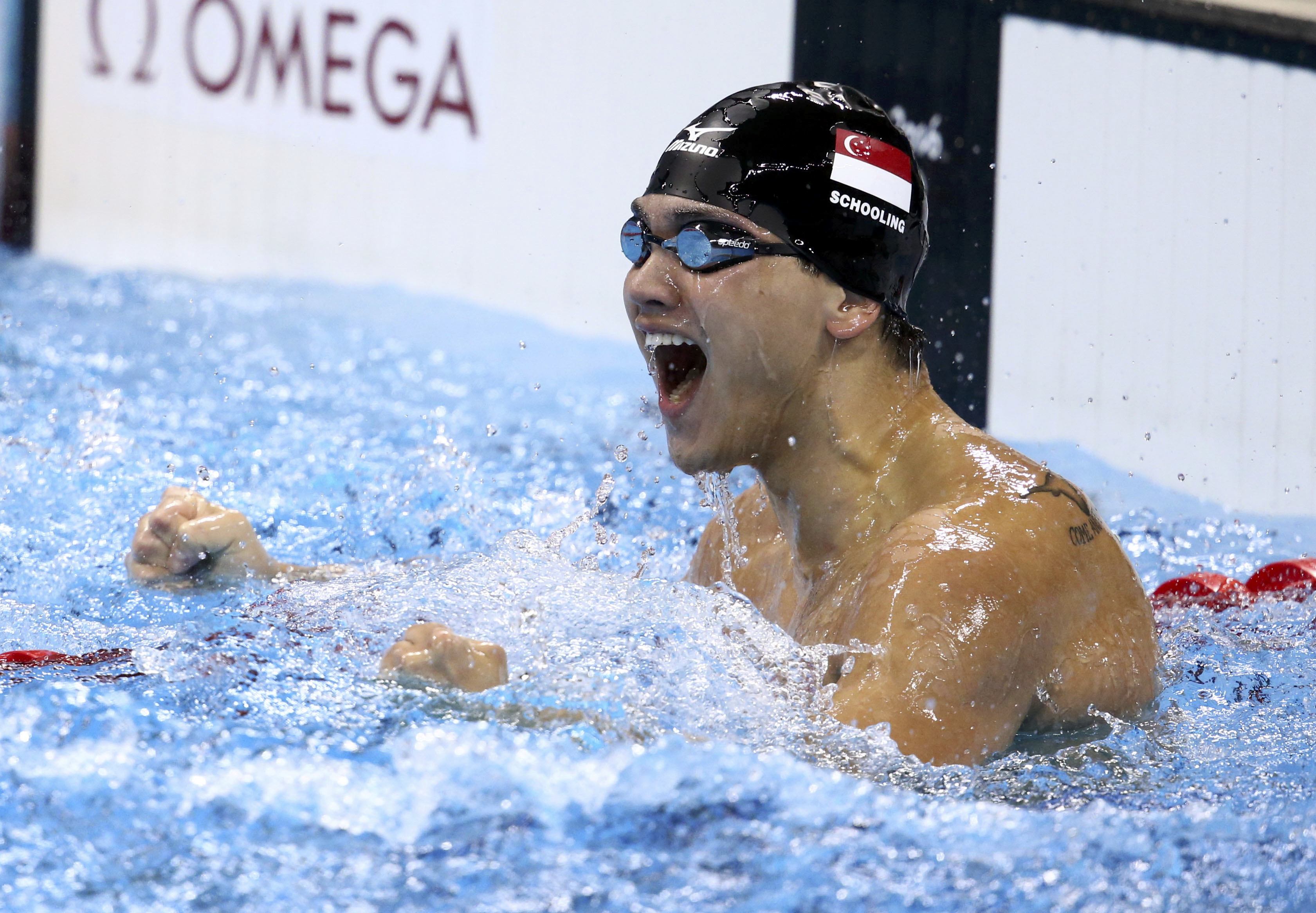 Mất HCV 100m bướm, Michael Phelps thua "tâm phục khẩu phục" Schooling