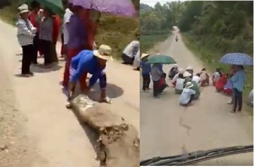 Phụ nữ, trẻ em chặn đường "xin đểu" tài xế xe chở heo ở biên giới