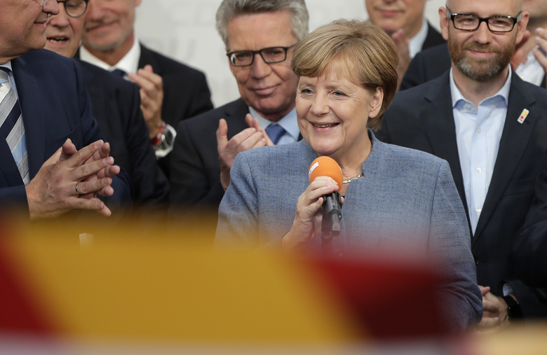 Bà Merkel tại trụ sở đảng Liên minh Dân chủ Cơ đốc giáo (CDU). Ảnh: AP