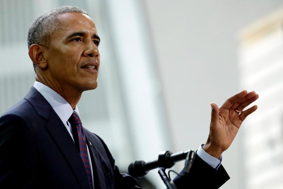 Ông Obama “trở lại chính trường” - Ảnh 1.