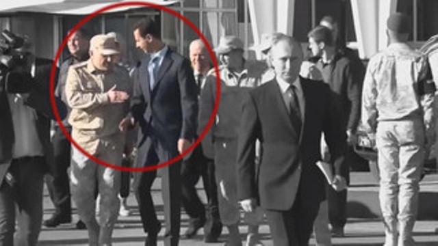 Binh sĩ Nga chặn tổng thống Syria lại gần ông Putin