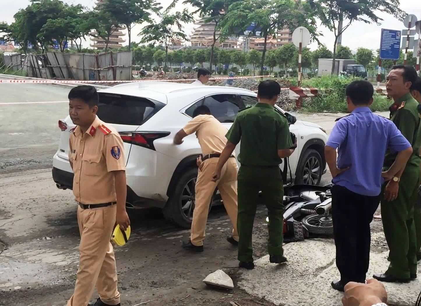 Kích đầu “xế hộp” giải cứu người phụ nữ lọt gầm sau tai nạn