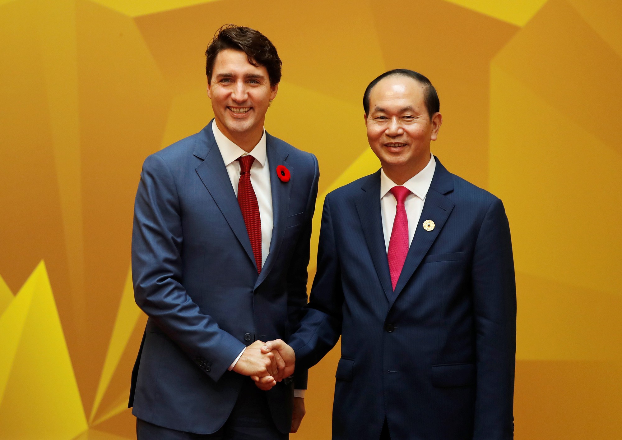 Chủ tịch nước Trần Đại Quang bắt tay Thủ tướng Canada Justin Trudeau. Ảnh: Reuters