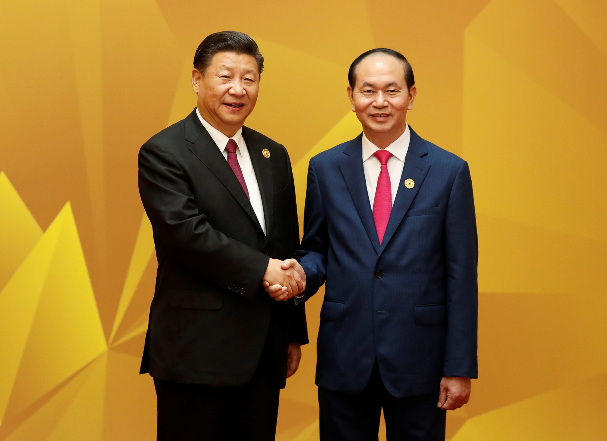 Chủ tịch nước đón Chủ tịch Trung Quốc Tập Cận Bình trước Hội nghị Cấp cao sáng 11-11. Ảnh: Reuters