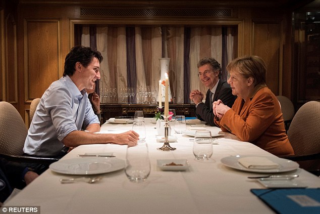 Tối 17-2, ông Trudeau đã gặp gỡ và dùng bữa tối với bà Merkel. Ảnh: Reuters.