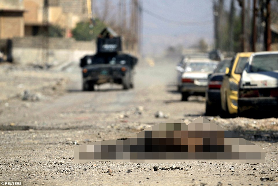 IS đang có dấu hiệu suy hiếu dần. Trong ảnh là xác của một tay súng IS tại Syria. Ảnh: Reuters