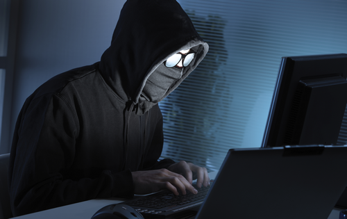 Vì sao hacker thích mặc áo trùm đầu, ngồi trong bóng tối