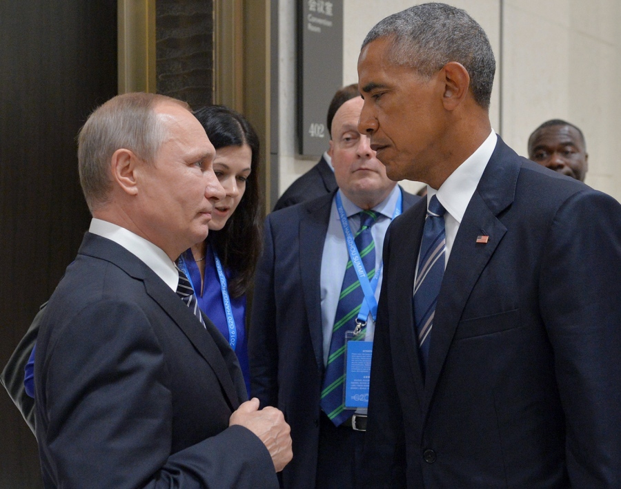 Cuộc đối mặt chưa từng tiết lộ giữa 2 &ocirc;ng Obama, Putin - Ảnh 1.