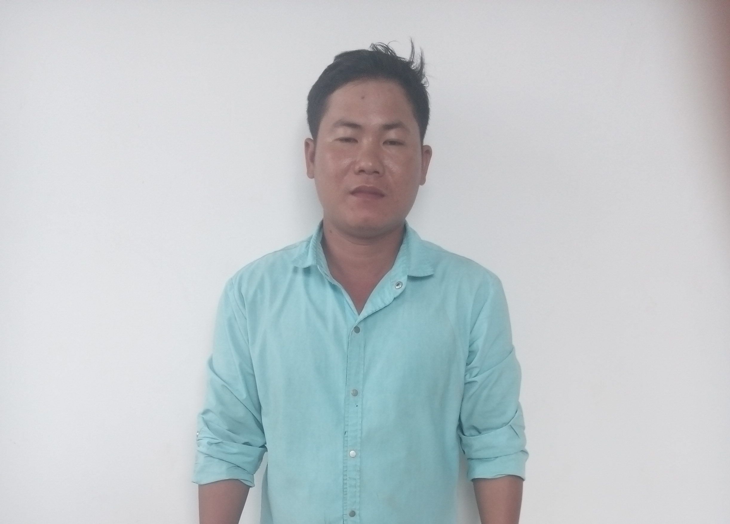 
Đối tượng Nguyễn Văn T&agrave;i tại cơ quan điều tra, ảnh: Ng. Chiến
