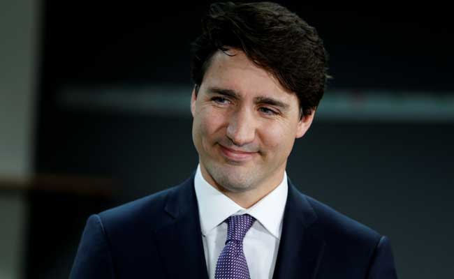 &Aacute;p lực bủa v&acirc;y &ocirc;ng Trudeau v&igrave; thương vụ vệ tinh với Trung Quốc - Ảnh 1.
