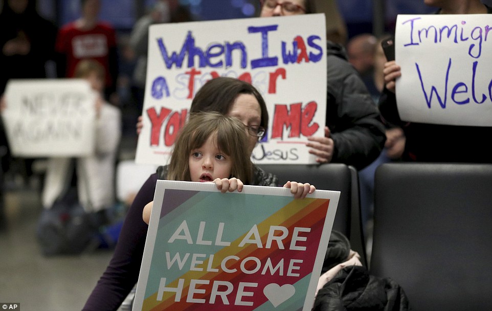 Demonstrators rallied at the Minneapolis-St Paul International Airport Saturday afternoon to protest against Trump's ban