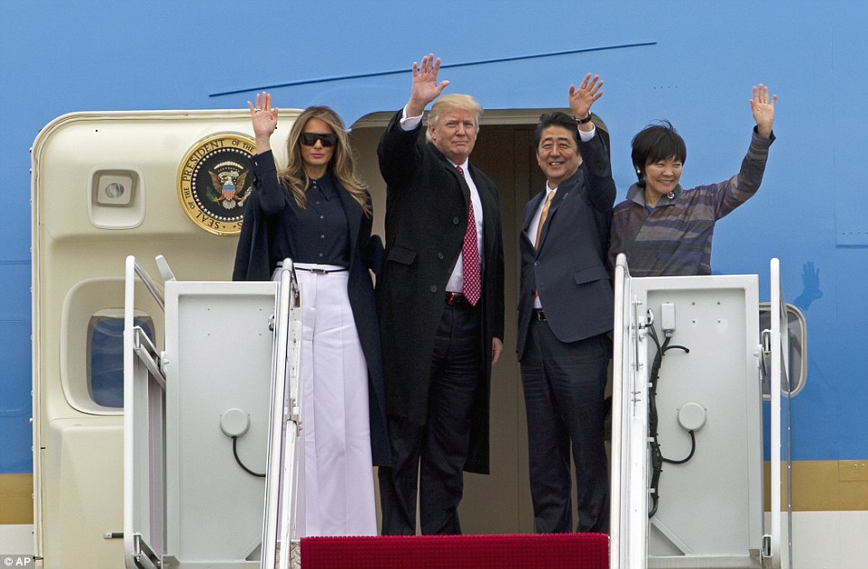 LETS GO TO FLORIDA: President Donald Trump and Japanese Prime Minister Shinzo Abe, accompanied by their wives, first lady Melania Trump and Akie Abe, wave before boarding Air Force One at Andrews Air Force Base