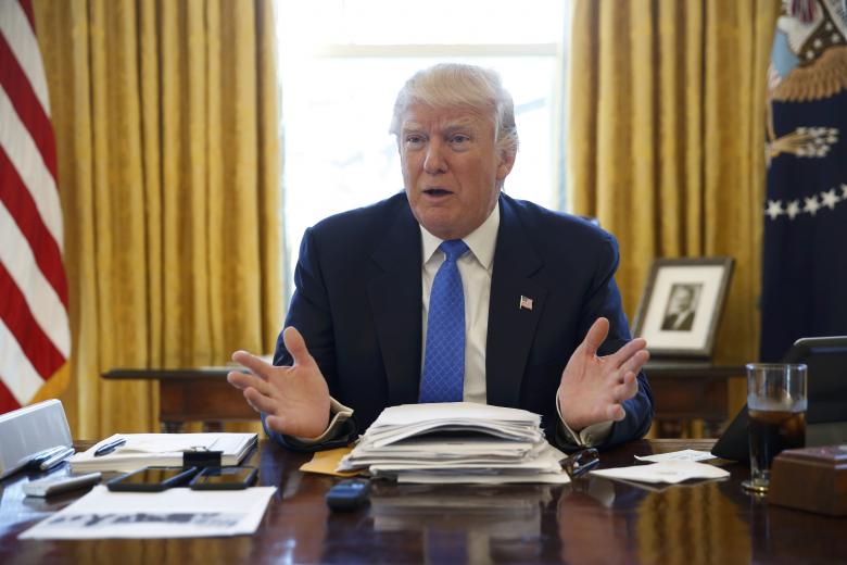 Ông Trump tuyên bố Trung Quốc "vô địch" thao túng tiền tệ