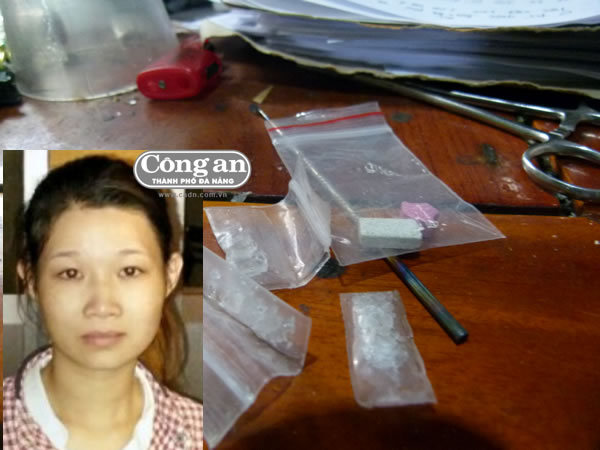 Nguyễn Thị Mỹ Nhung và tang vật vụ án.