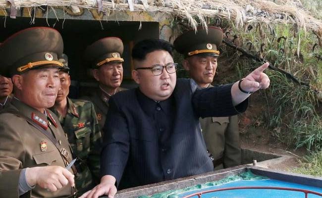 Ông Kim Jong-un bất ngờ xuất hiện và mở lời về kế hoạch đánh Guam - Ảnh 2.