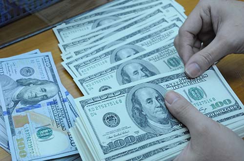 Sức ép tăng tỉ giá