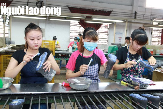 Công bố việc trả lương, thưởng Tết trước 31-12 - Ảnh 1.