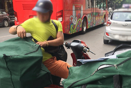 Bỏ việc đúng nghề mà lương thấp, tôi chạy giao hàng thu nhập gấp đôi - Ảnh 1.