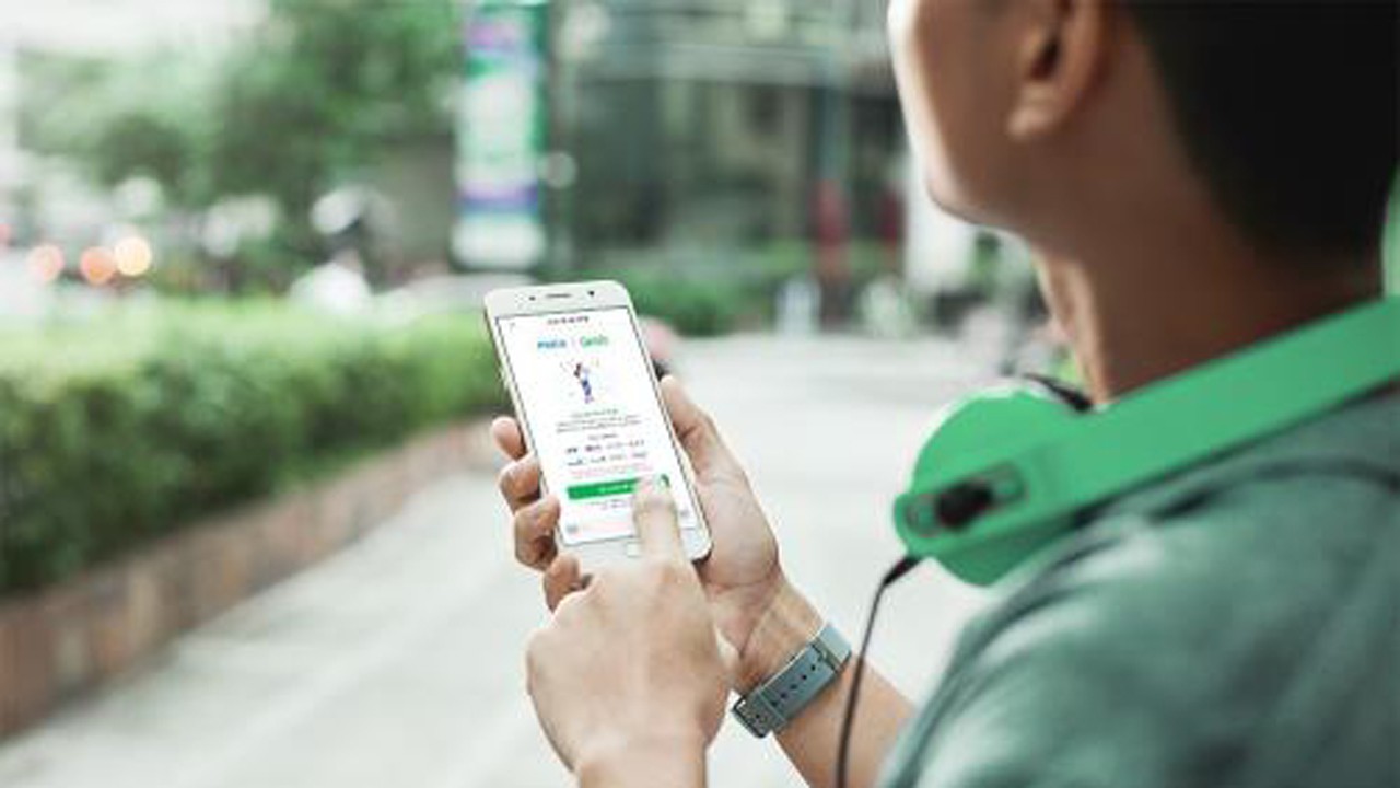 Grab hứa sẽ trả lại tiền cho người d&ugrave;ng GrabPay - Ảnh 1.