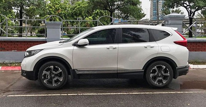Nghịch l&yacute; &ocirc;t&ocirc; cũ gi&aacute; cao hơn xe mới ni&ecirc;m yết - Ảnh 1.