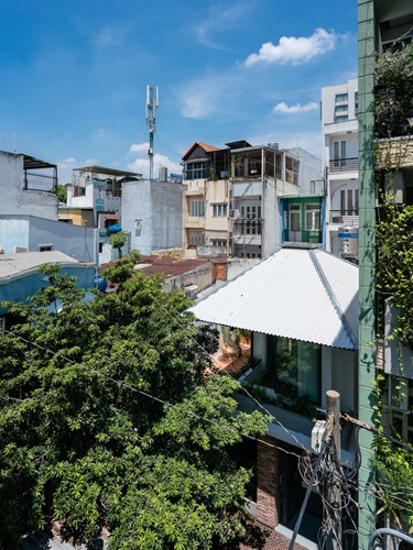 Ngôi nhà gạch mộc ở TP HCM đẹp giản dị trên báo Tây - Ảnh 1.