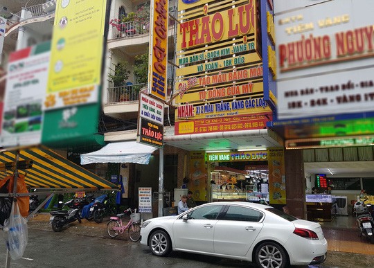 Vụ đổi 100 USD: Chủ tiệm v&agrave;ng phản ph&aacute;o quyết định xử phạt - Ảnh 1.