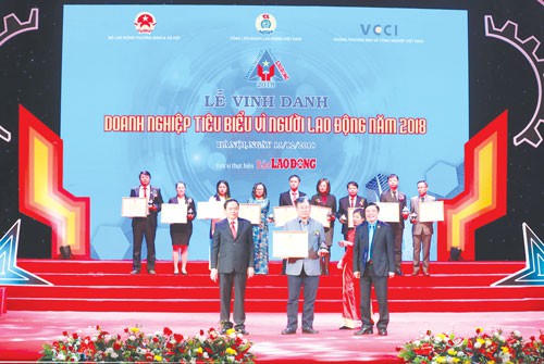 Vinh danh 60 doanh nghiệp chăm lo tốt người lao động - Ảnh 1.
