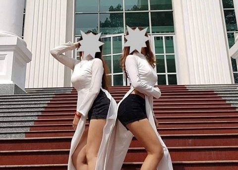 Hai nữ sinh bận áo dài - quần đùi "hối hận, mong được trường bảo vệ"