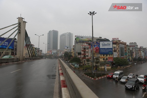 Không ồn ào vội vã, Sài Gòn - Hà Nội được trả lại vẻ yên bình trong ngày mùng 1 Tết - Ảnh 13.