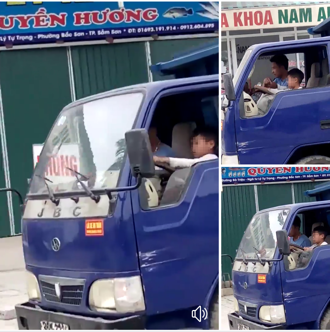 B&eacute; trai l&aacute;i xe tải chạy băng băng tr&ecirc;n phố Sầm Sơn - Ảnh 1.