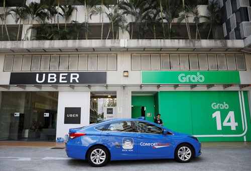 Uber về tay Grab