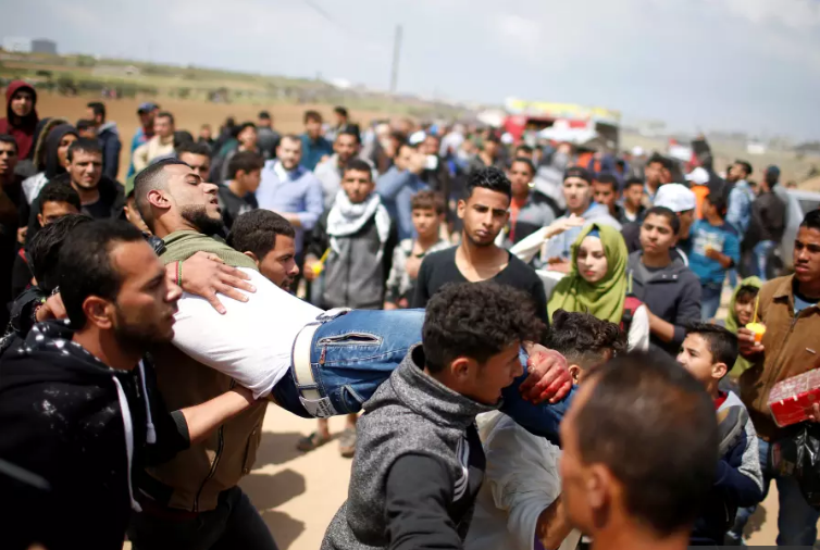 Đụng độ đẫm m&aacute;u ở Dải Gaza, hơn 1.000 người thương vong - Ảnh 5.