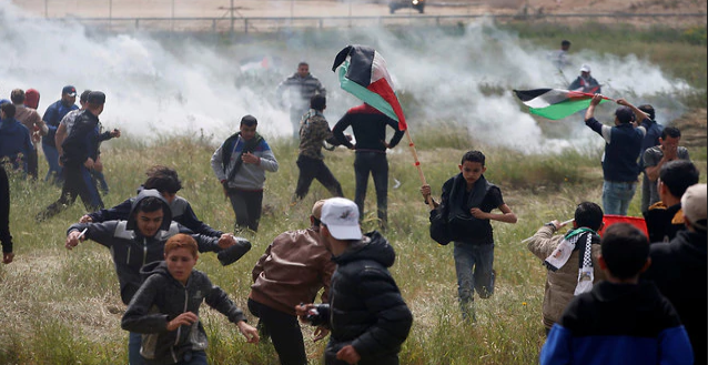 Đụng độ đẫm m&aacute;u ở Dải Gaza, hơn 1.000 người thương vong - Ảnh 4.