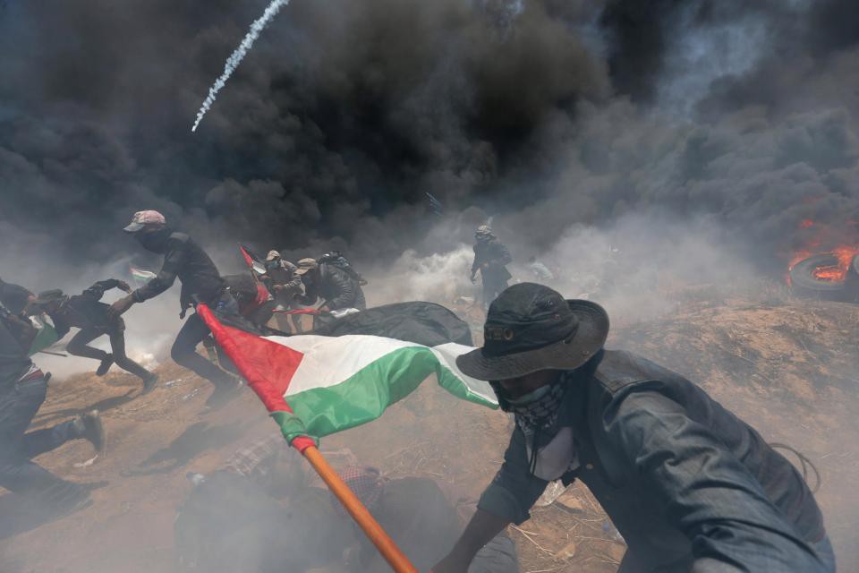 Ng&agrave;y đẫm m&aacute;u ở Gaza: B&eacute; 8 th&aacute;ng tuổi thiệt mạng v&igrave; kh&iacute; cay - Ảnh 9.