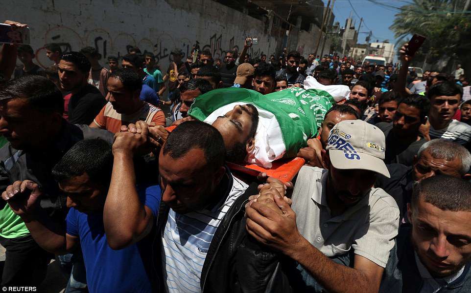 Ng&agrave;y đẫm m&aacute;u ở Gaza: B&eacute; 8 th&aacute;ng tuổi thiệt mạng v&igrave; kh&iacute; cay - Ảnh 4.