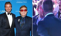Elton John hôn David Beckham trong đám cưới Hoàng tử Anh