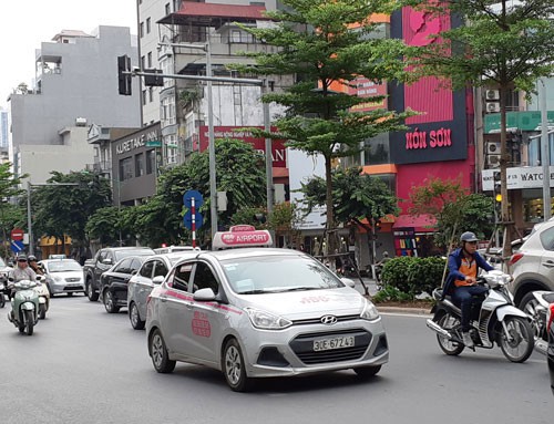 Vẫn rối quản lý taxi, Grab